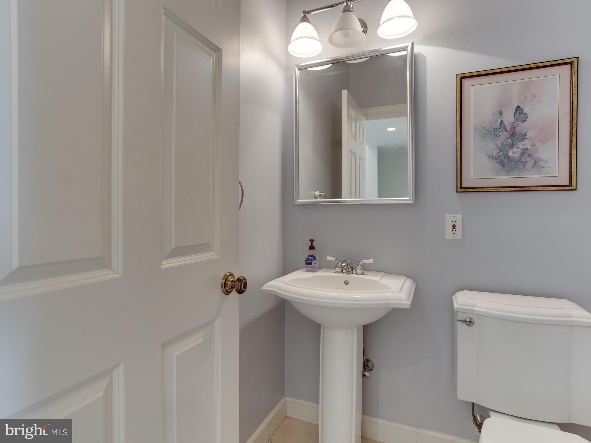 5970 Little Road Lothian, MD 20711 - Photo 21 of 60 half bath in hallway.