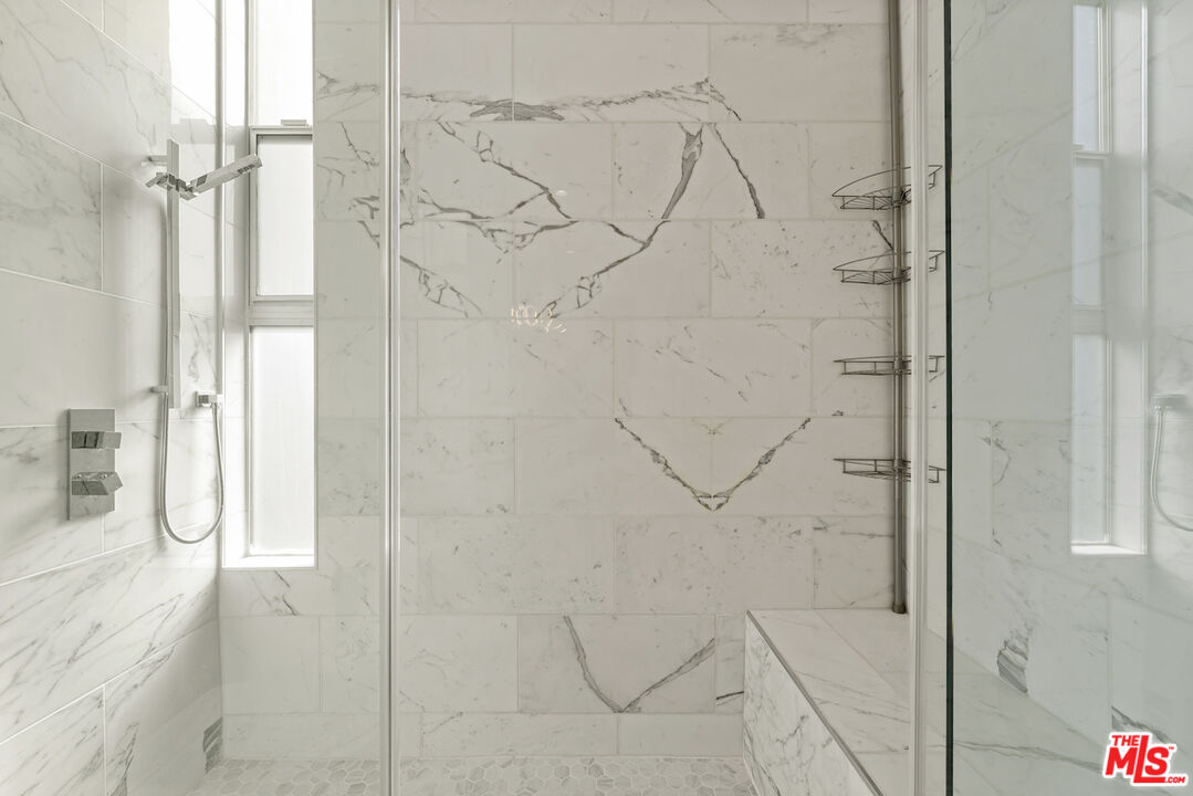 1 Eastwind Street, Unit 201 Marina del Rey, CA 90292 - Photo 27 of 40 a bathroom with a shower