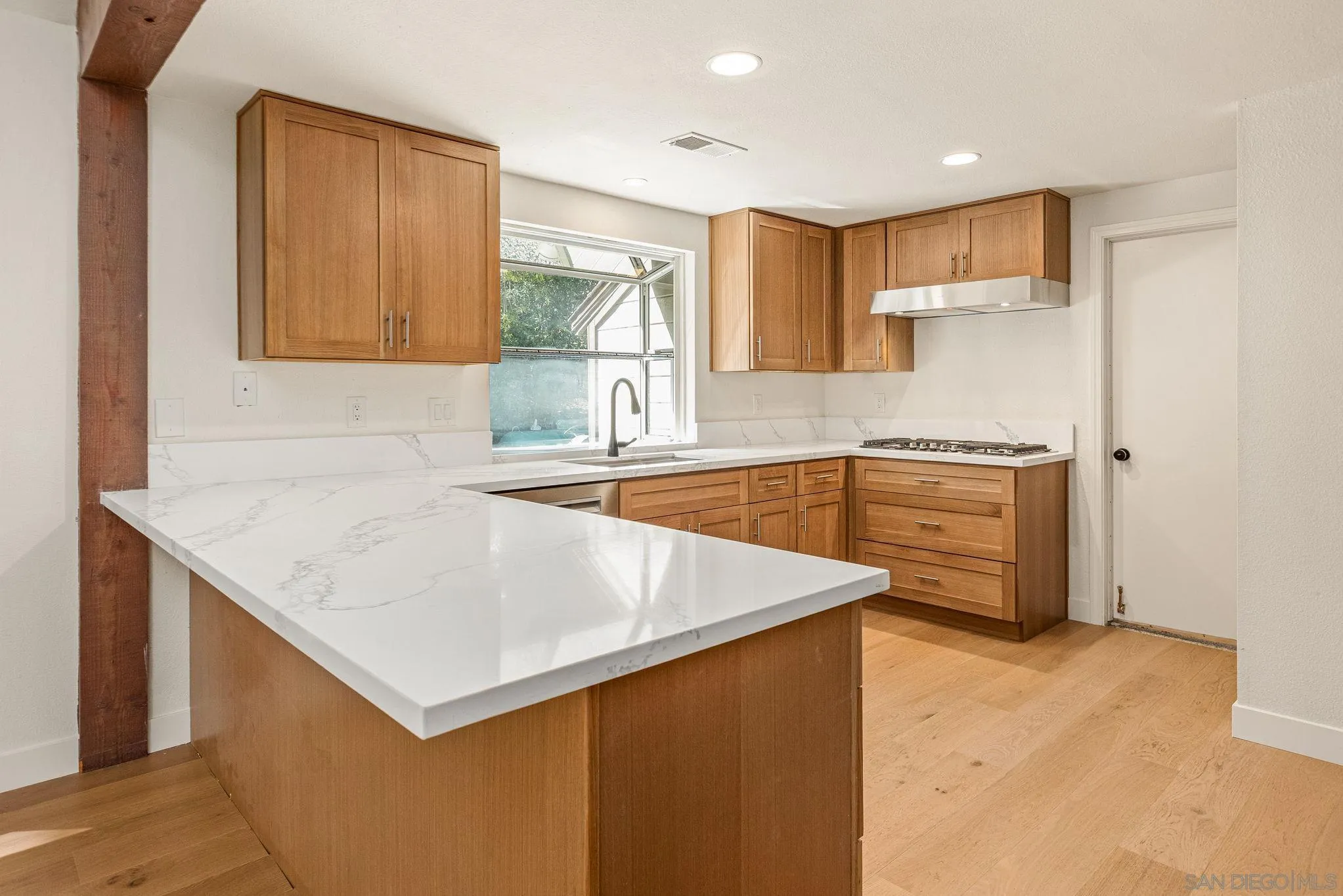 2029 Winterwarm Drive Fallbrook, CA 92028 - Photo 21 of 36 a kitchen that has a sink a stove and a refrigerator