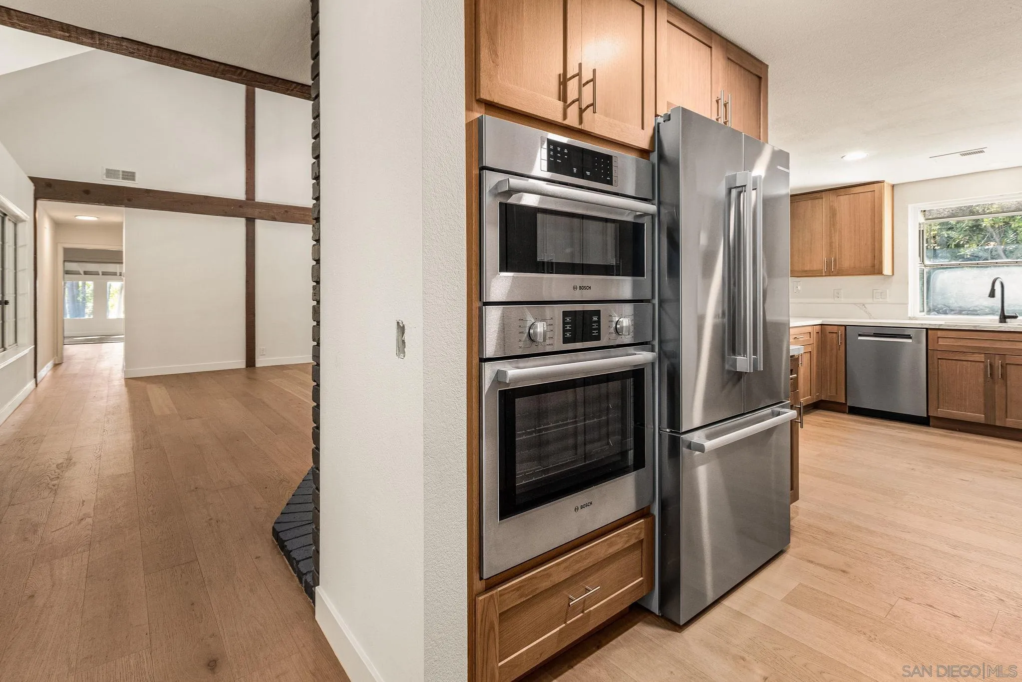 2029 Winterwarm Drive Fallbrook, CA 92028 - Photo 24 of 36 a kitchen with stainless steel appliances granite countertop a refrigerator and a stove
