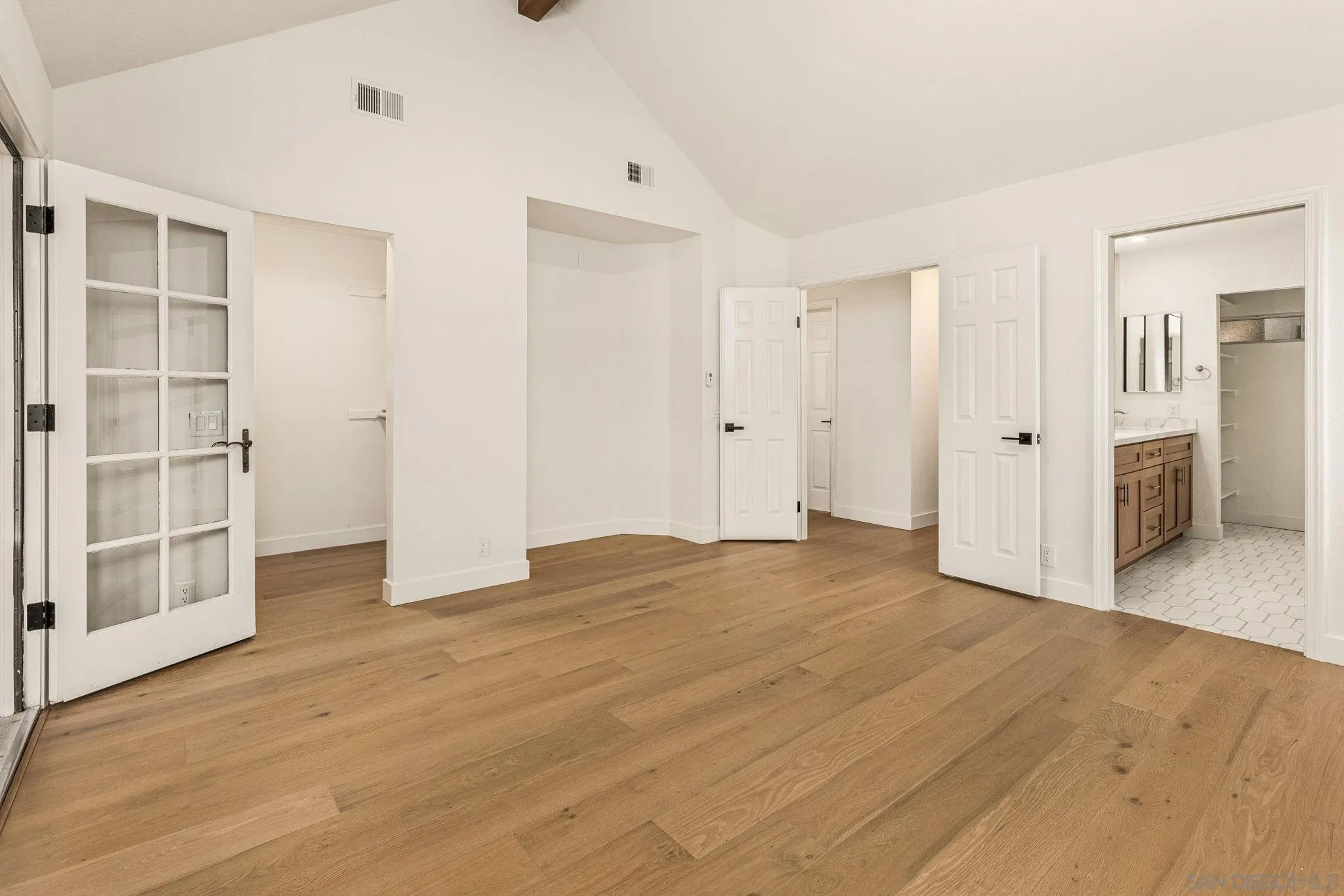 2029 Winterwarm Drive Fallbrook, CA 92028 - Photo 26 of 36 a view of an empty room with wooden floor and a window