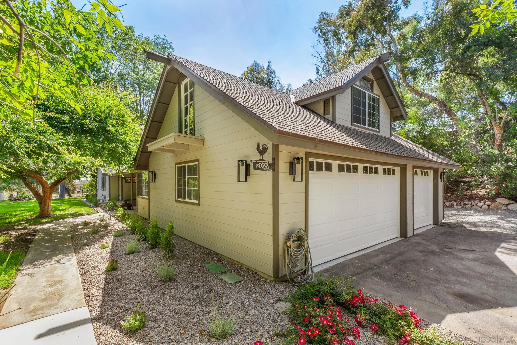 2029 Winterwarm Drive Fallbrook, CA 92028 - Photo 5 of 36 a view of a house with a yard