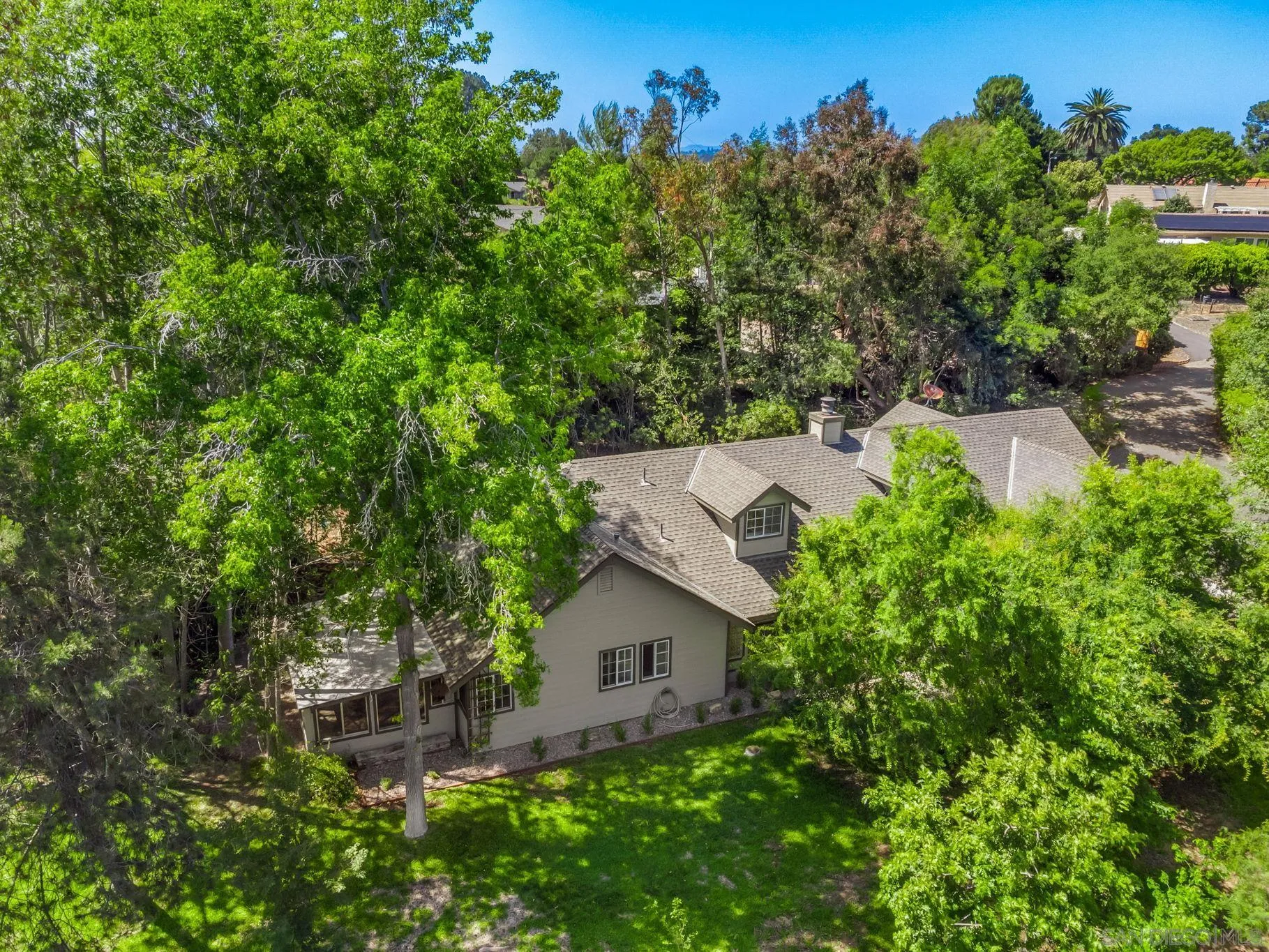 2029 Winterwarm Drive Fallbrook, CA 92028 - Photo 9 of 36 an aerial view of a house with yard and outdoor seating