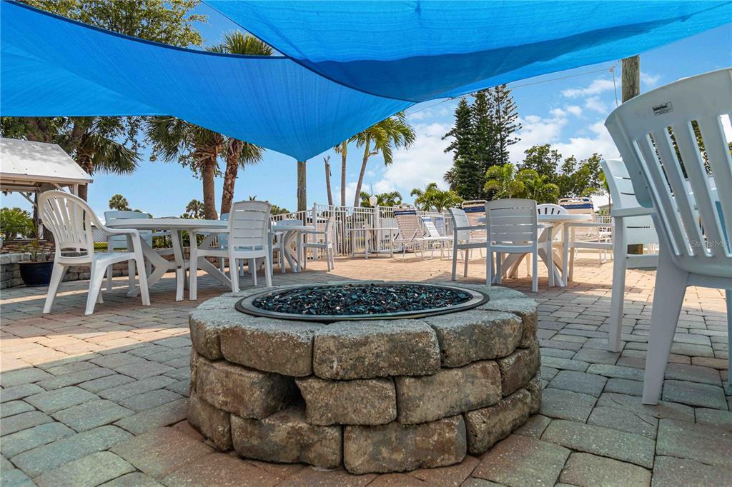 10303 Burnt Store Road, Unit 54 Punta Gorda, FL 33950 - Photo 26 of 27 a view of a swimming pool with a patio