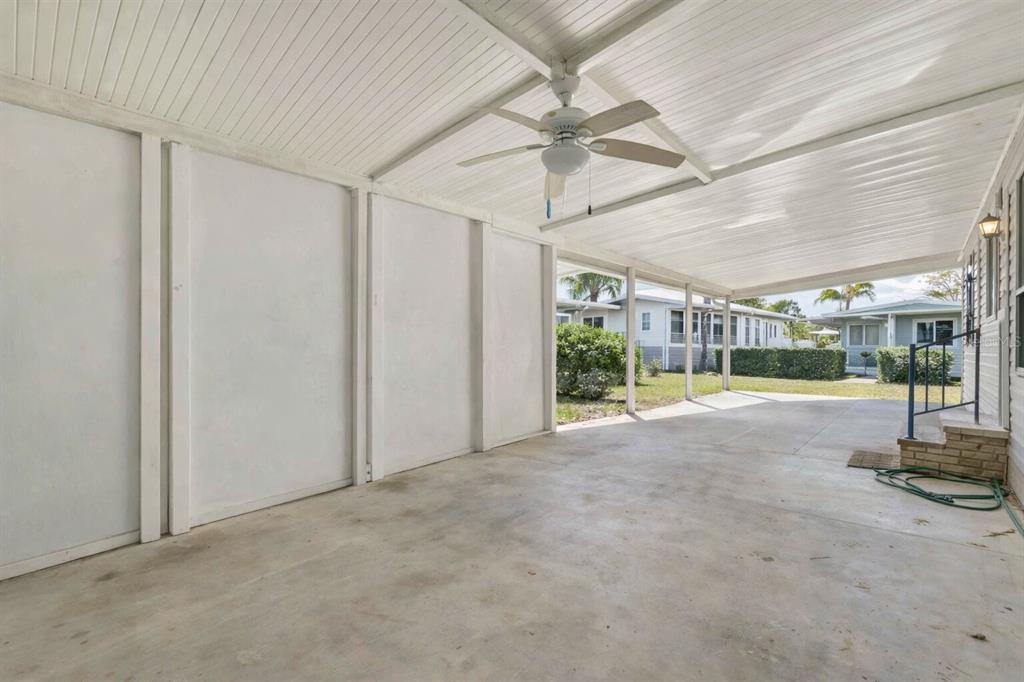 10303 Burnt Store Road, Unit 54 Punta Gorda, FL 33950 - Photo 3 of 27 a view of a room with gym equipment