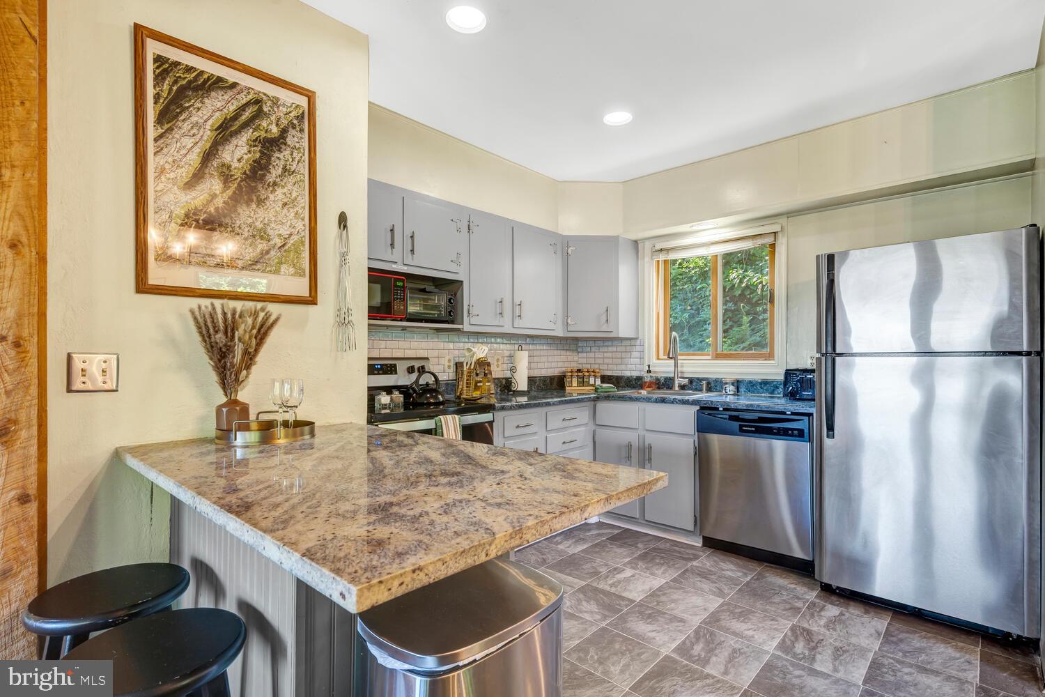 6235 South Page Valley Road Luray, VA 22835 - Photo 15 of 52 Modern kitchen with natural light.