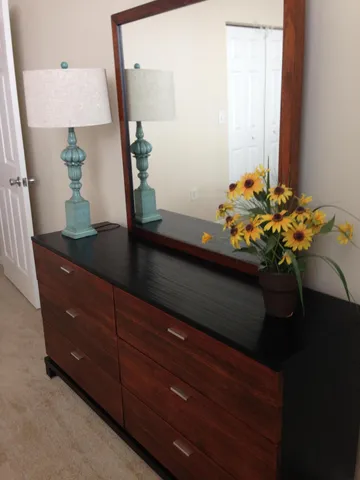 a sink sitting next to a window