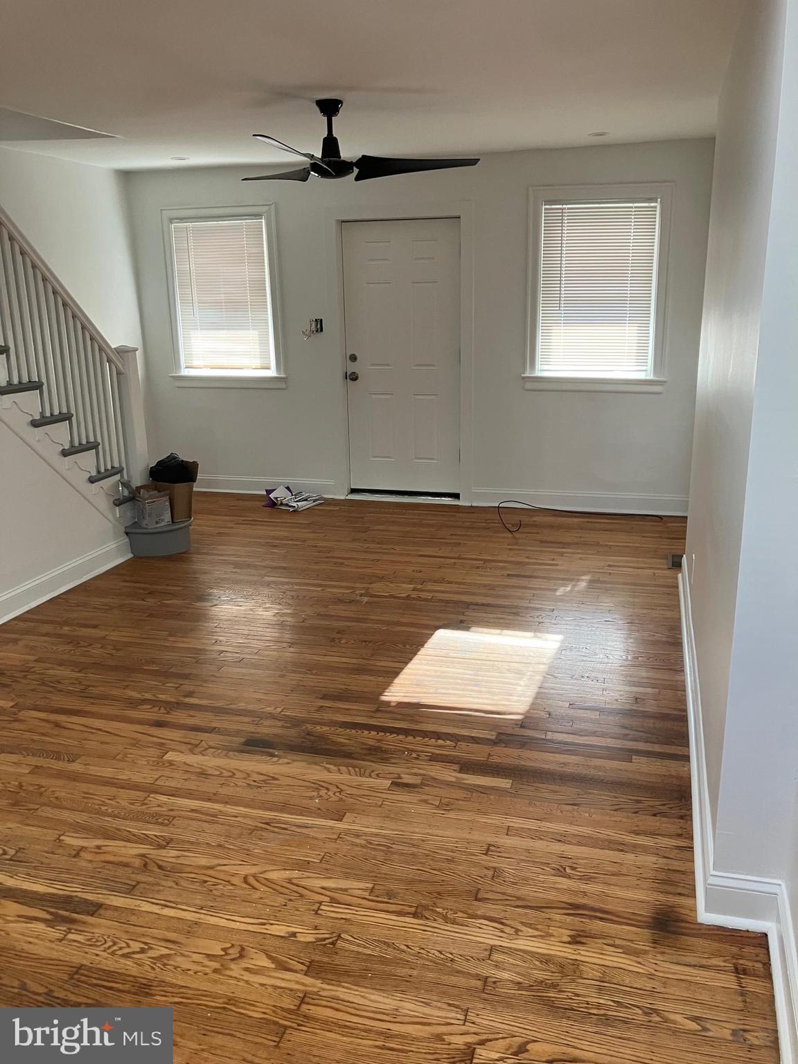 3014 Memphis Street Philadelphia, PA 19134 - Photo 3 of 15 an empty room with wooden floor and windows