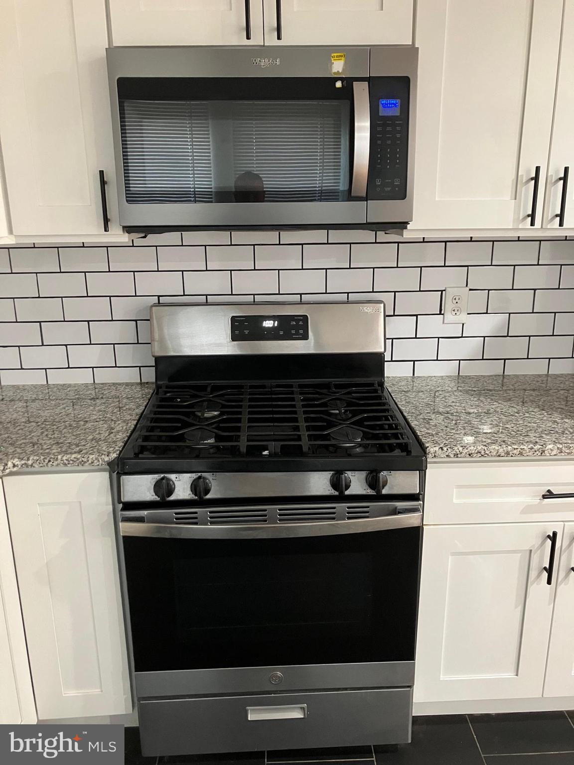 3014 Memphis Street Philadelphia, PA 19134 - Photo 6 of 15 a stove top oven sitting inside of a kitchen