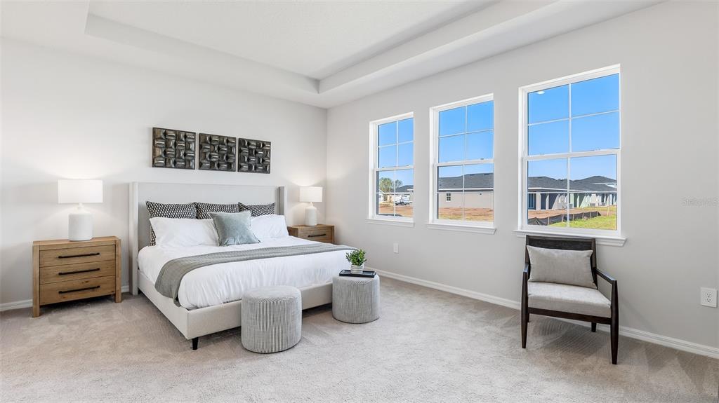 1709 Cobb Trail Parrish, FL 34219 - Photo 11 of 26 a bedroom with a bed and a window