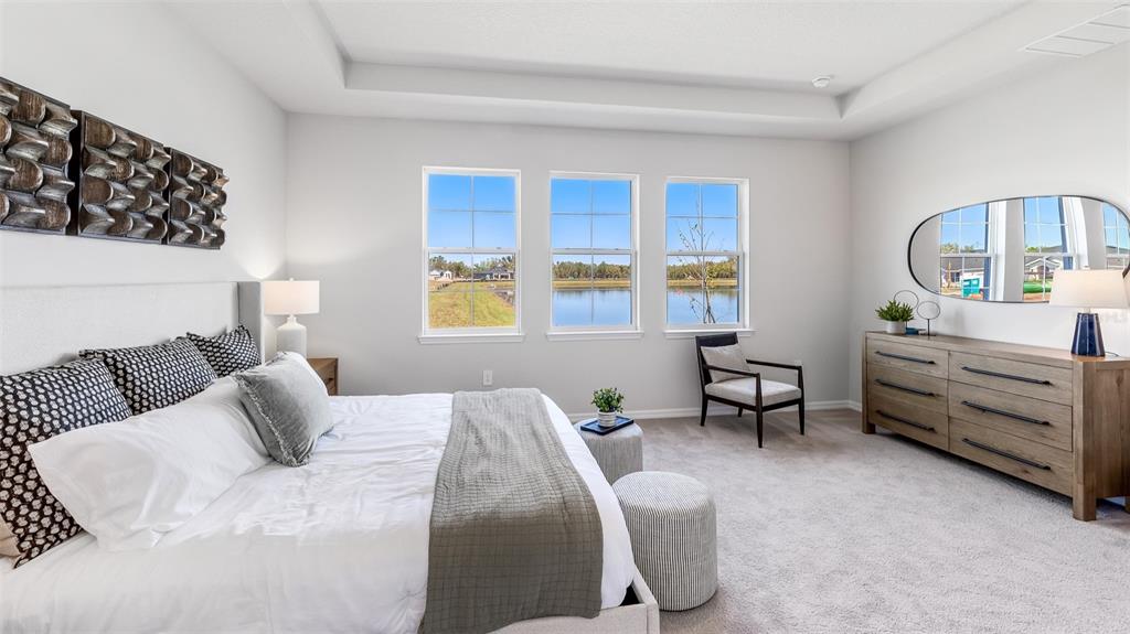 1709 Cobb Trail Parrish, FL 34219 - Photo 12 of 26 a bedroom with a bed and a window