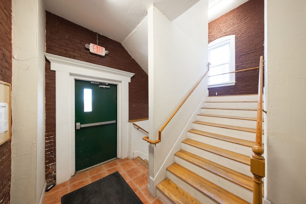 32 Providence Street, Unit 5 Worcester, MA 01604 - Photo 28 of 42 a view of entryway and hall with wooden floor