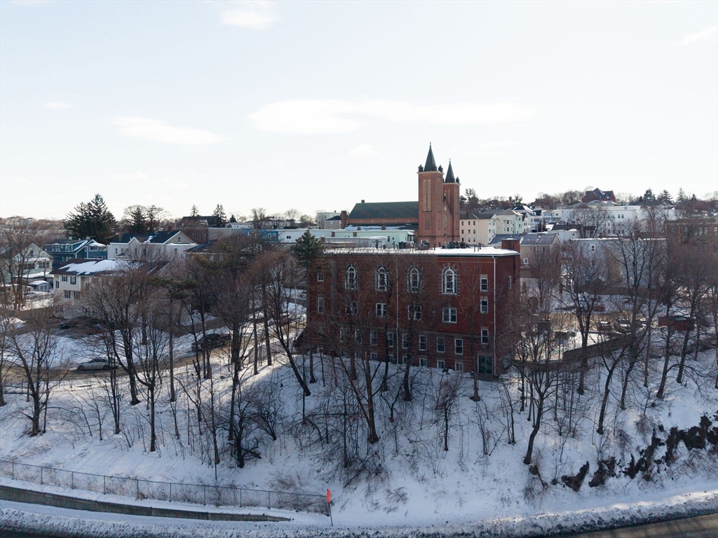 32 Providence Street, Unit 5 Worcester, MA 01604 - Photo 34 of 42 a view of a terrace with a table and chairs
