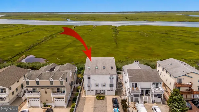 a view of an ocean and a building