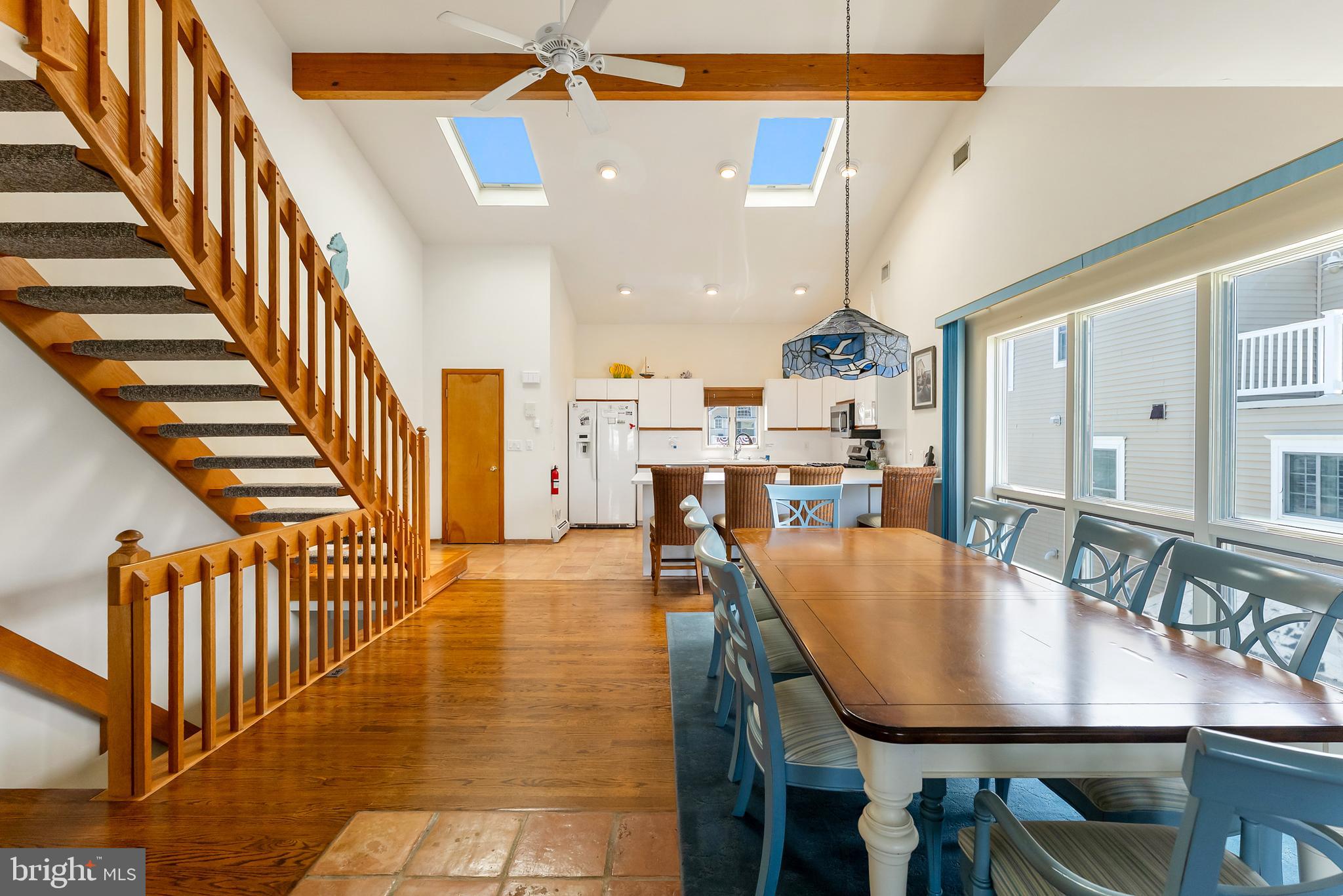 6500 Central Avenue, Unit SOUTH Sea Isle City, NJ 08243 - Photo 17 of 54 a dining room with furniture and wooden floor