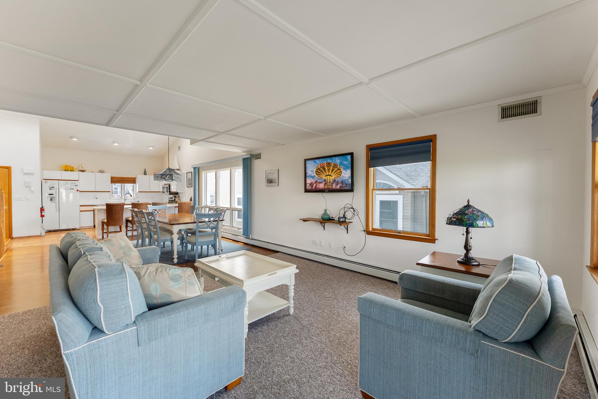 6500 Central Avenue, Unit SOUTH Sea Isle City, NJ 08243 - Photo 21 of 54 a living room with furniture and a large window