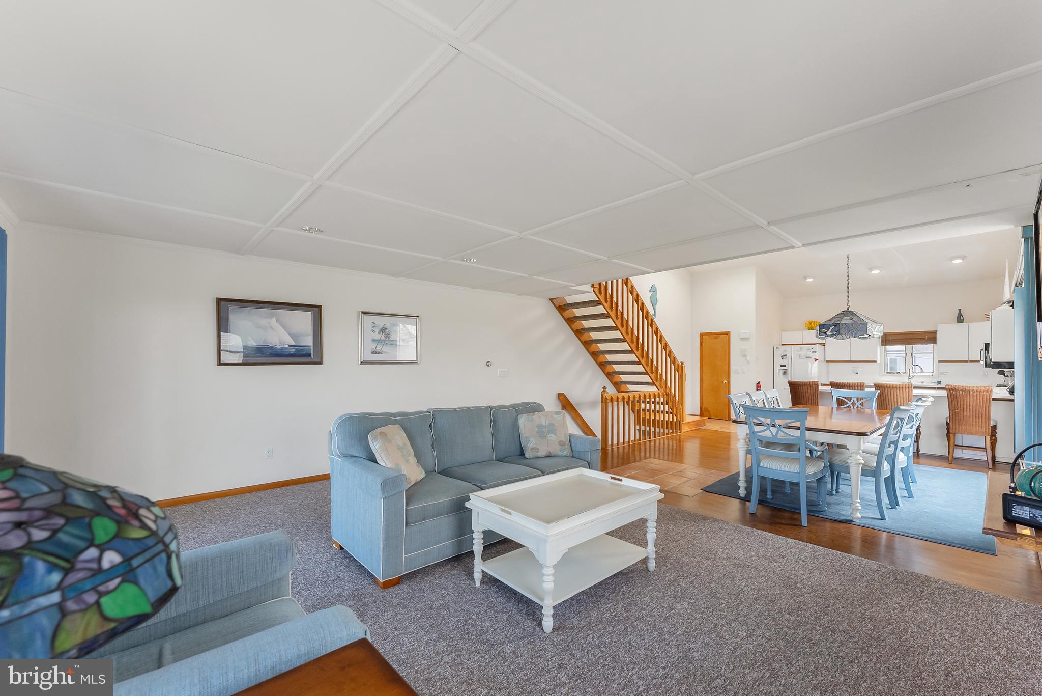 6500 Central Avenue, Unit SOUTH Sea Isle City, NJ 08243 - Photo 22 of 54 a living room with furniture and a wooden floor