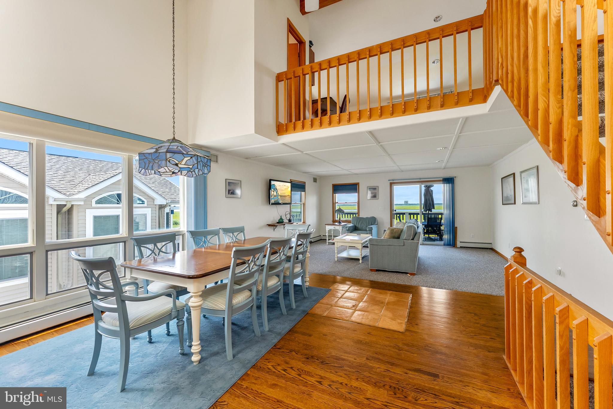 6500 Central Avenue, Unit SOUTH Sea Isle City, NJ 08243 - Photo 23 of 54 a view of a dining room with furniture window and wooden floor