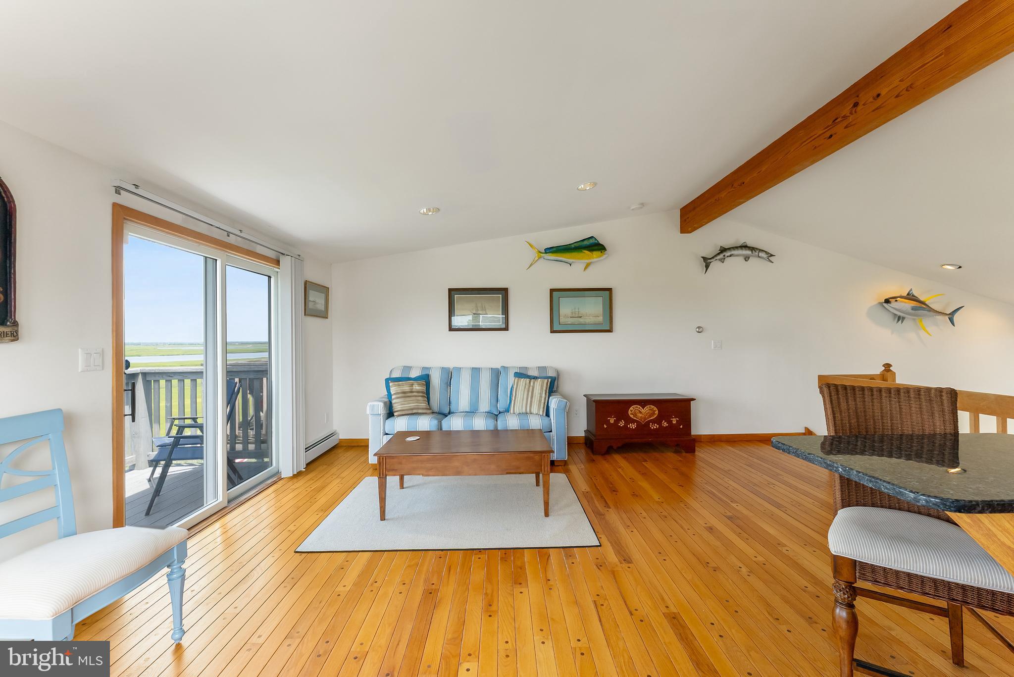 6500 Central Avenue, Unit SOUTH Sea Isle City, NJ 08243 - Photo 35 of 54 a living room with furniture and a flat screen tv