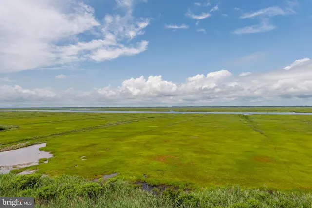 a view of a balcony with furniture