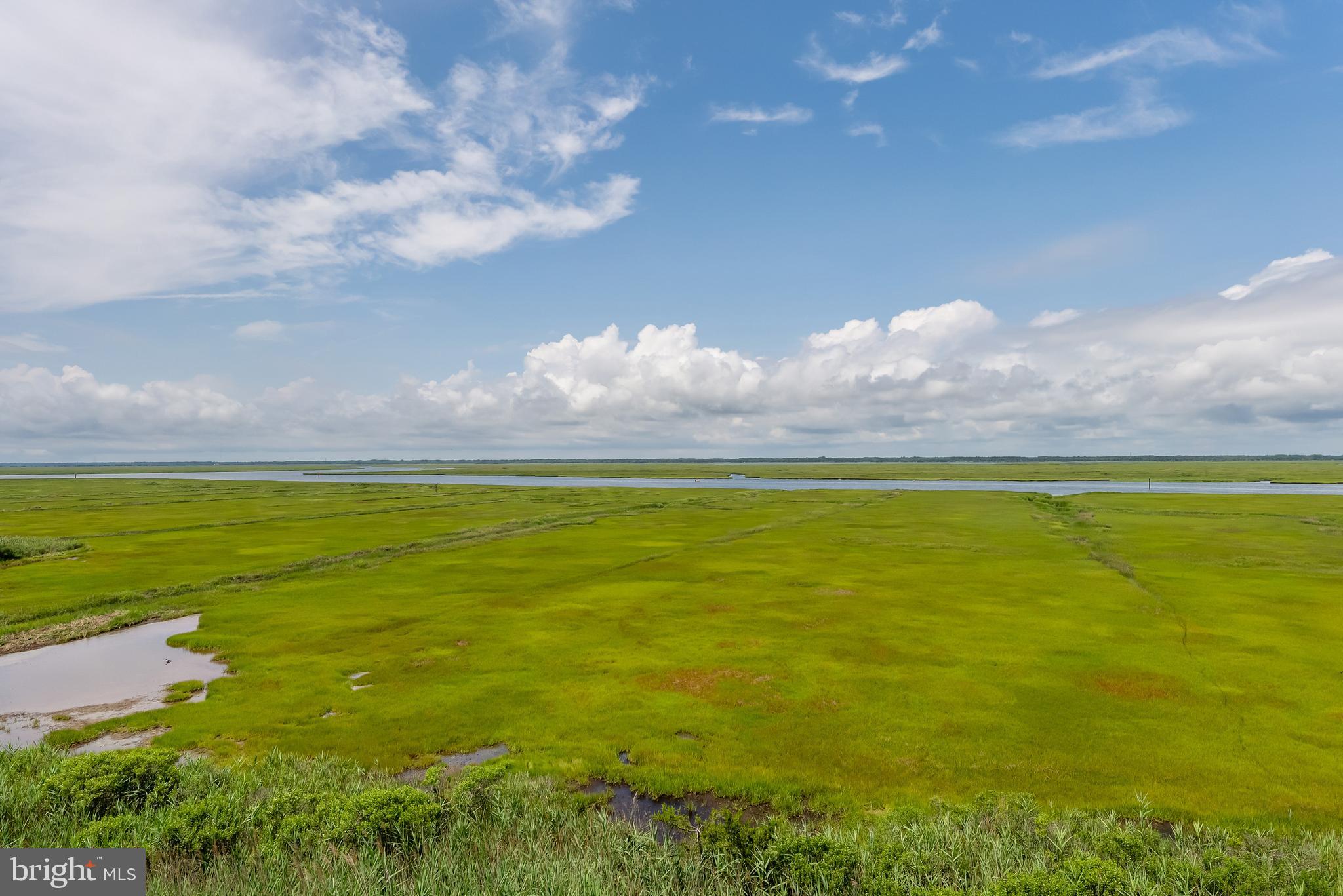 6500 Central Avenue, Unit SOUTH Sea Isle City, NJ 08243 - Photo 40 of 54 a view of an ocean and a mountain
