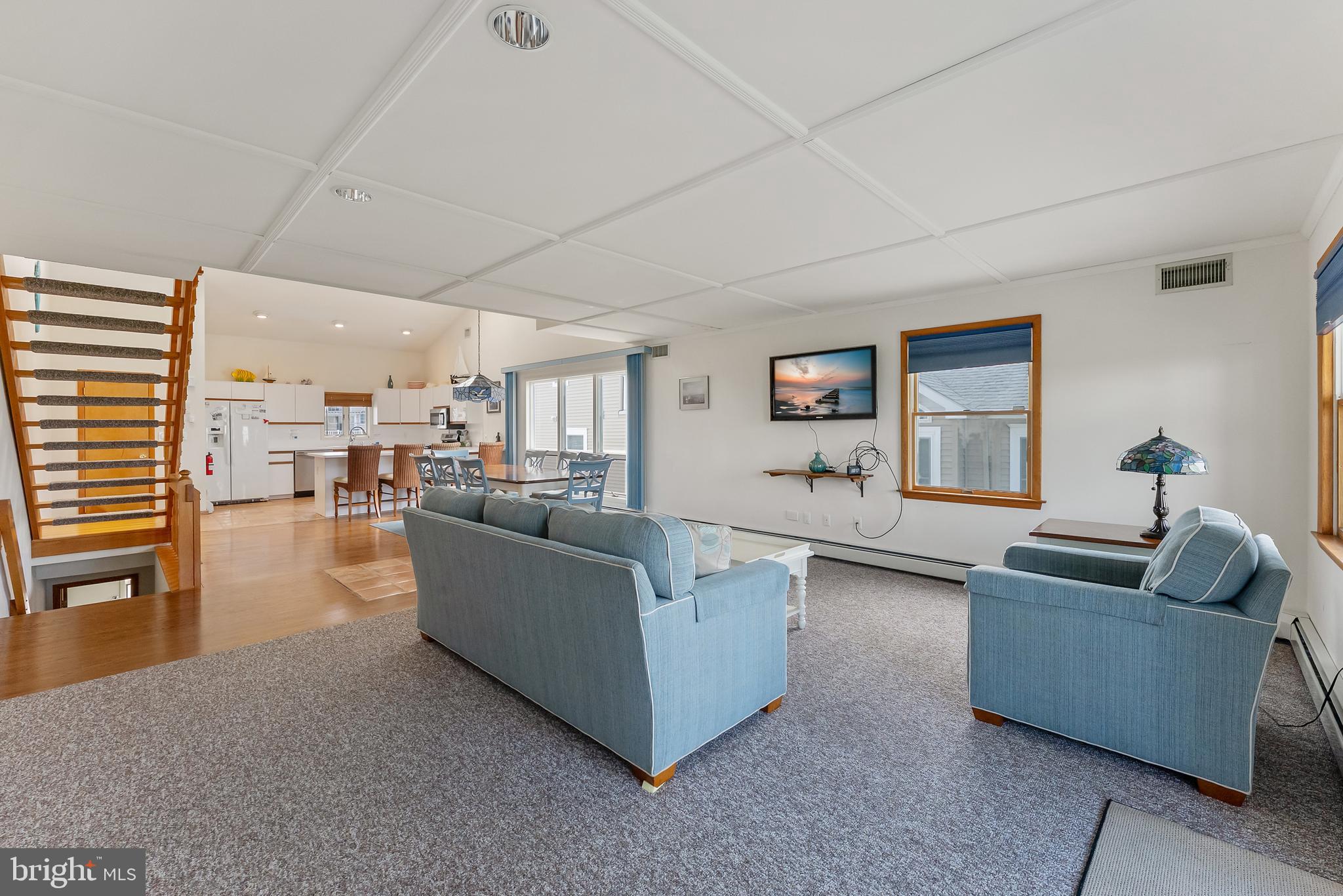 6500 Central Avenue, Unit SOUTH Sea Isle City, NJ 08243 - Photo 48 of 54 a living room with furniture and a wooden floor