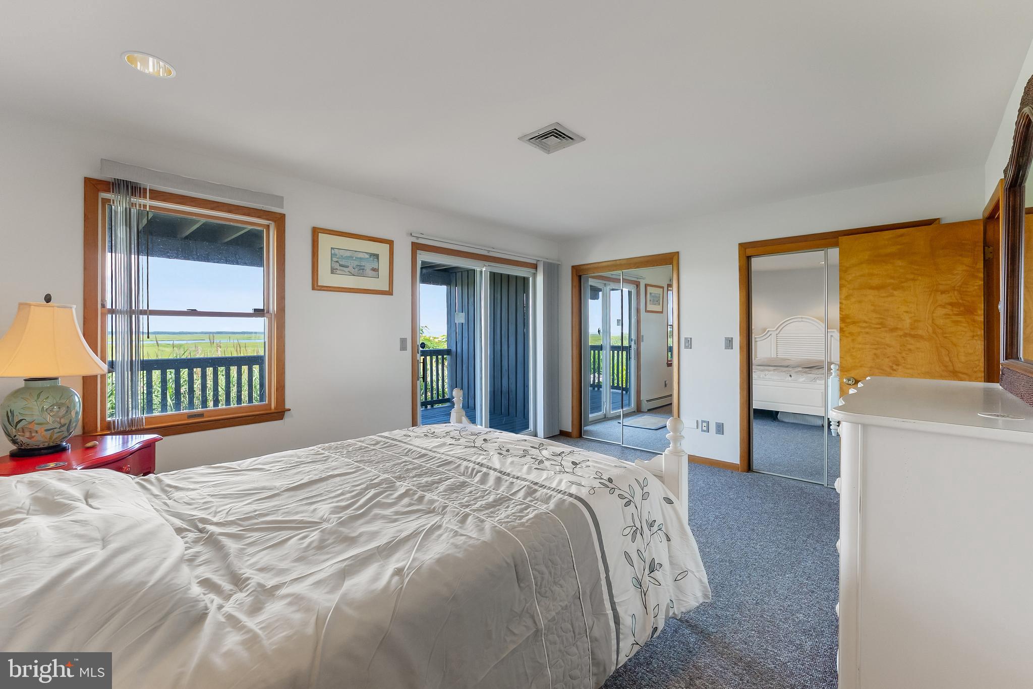 6500 Central Avenue, Unit SOUTH Sea Isle City, NJ 08243 - Photo 5 of 54 a bedroom with a bed and a window