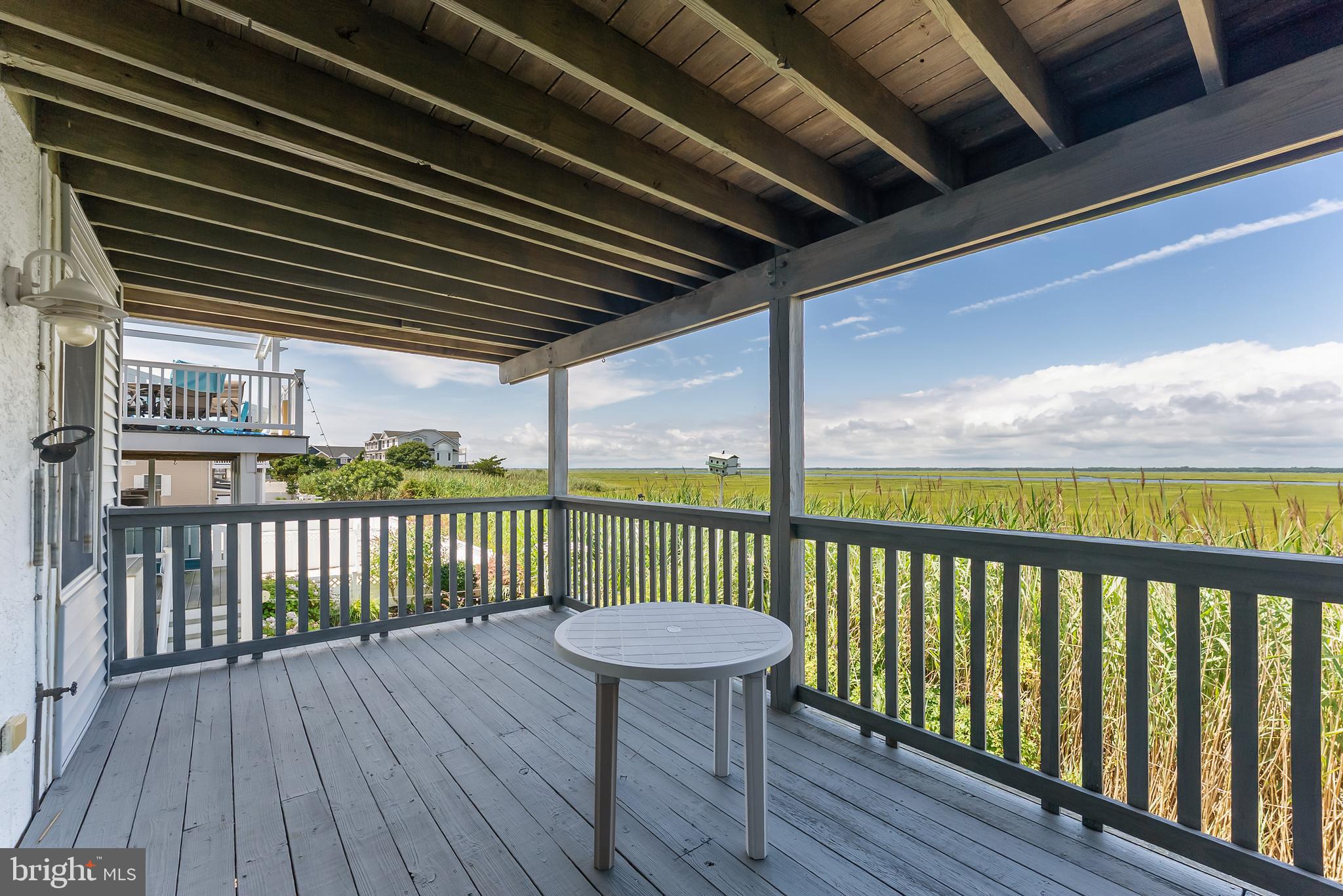 6500 Central Avenue, Unit SOUTH Sea Isle City, NJ 08243 - Photo 7 of 54 a view of a two chairs in the balcony