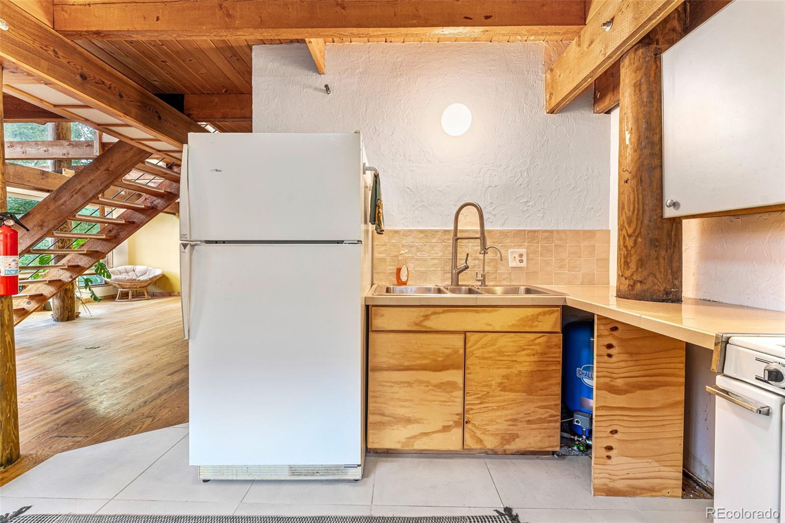 198 Range Road Nederland, CO 80466 - Photo 14 of 40 a bathroom with a sink and a mirror