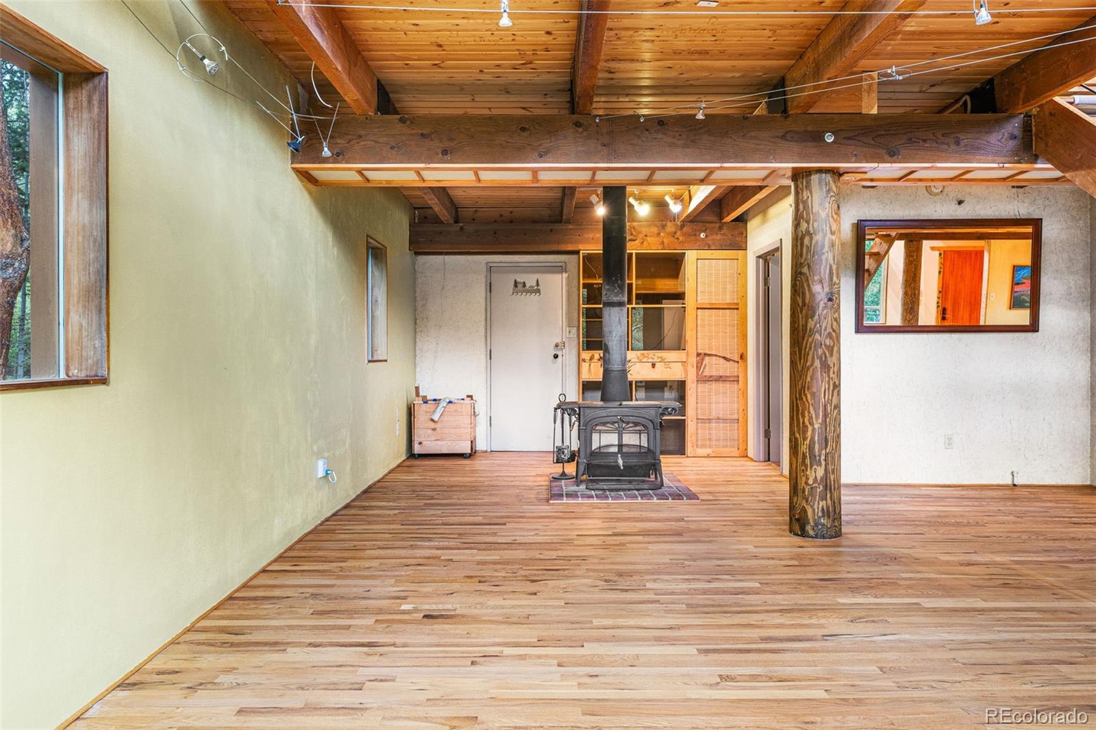 198 Range Road Nederland, CO 80466 - Photo 17 of 40 a view of a room with wooden floor