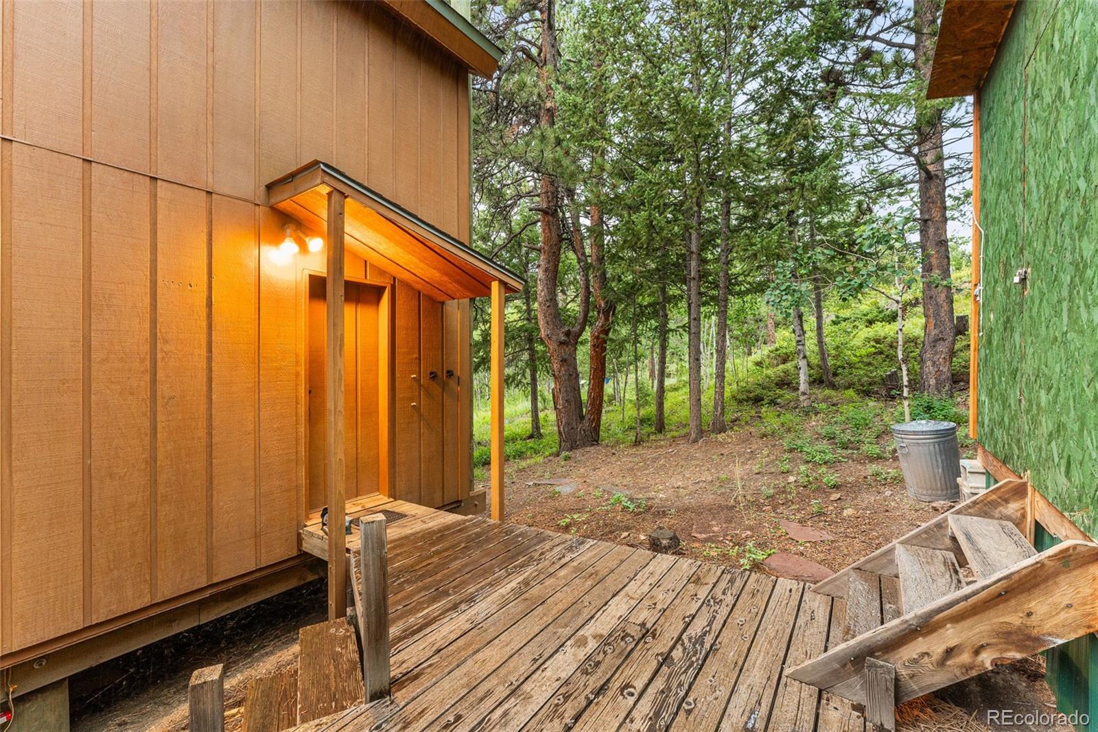 198 Range Road Nederland, CO 80466 - Photo 32 of 40 a backyard of a house