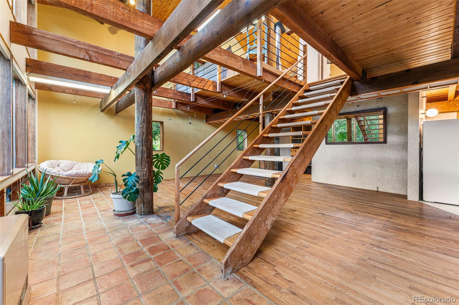 198 Range Road Nederland, CO 80466 - Photo 8 of 40 a view of entryway with wooden floor