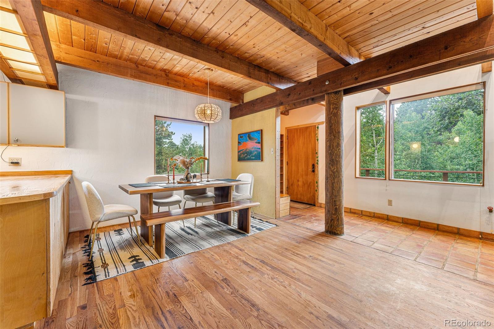 198 Range Road Nederland, CO 80466 - Photo 10 of 40 a view of a dining room with furniture window and outside view
