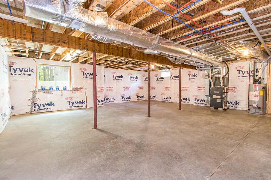 22 Southport Drive Mashpee, MA 02649 - Photo 23 of 27 a view of a room with gym equipment