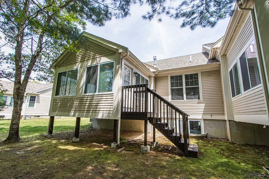 22 Southport Drive Mashpee, MA 02649 - Photo 25 of 27 a view of a house with a yard