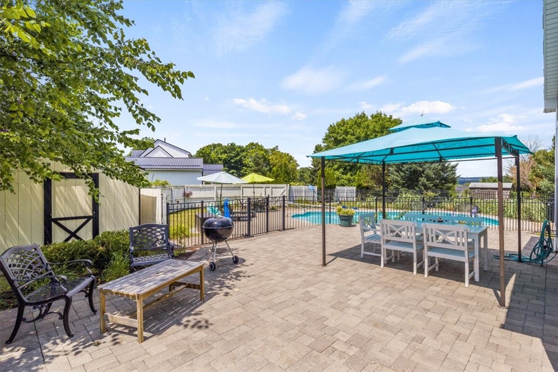 6965 Alydar Circle Victor, NY 14564 - Photo 34 of 44 Patio and Pool Area