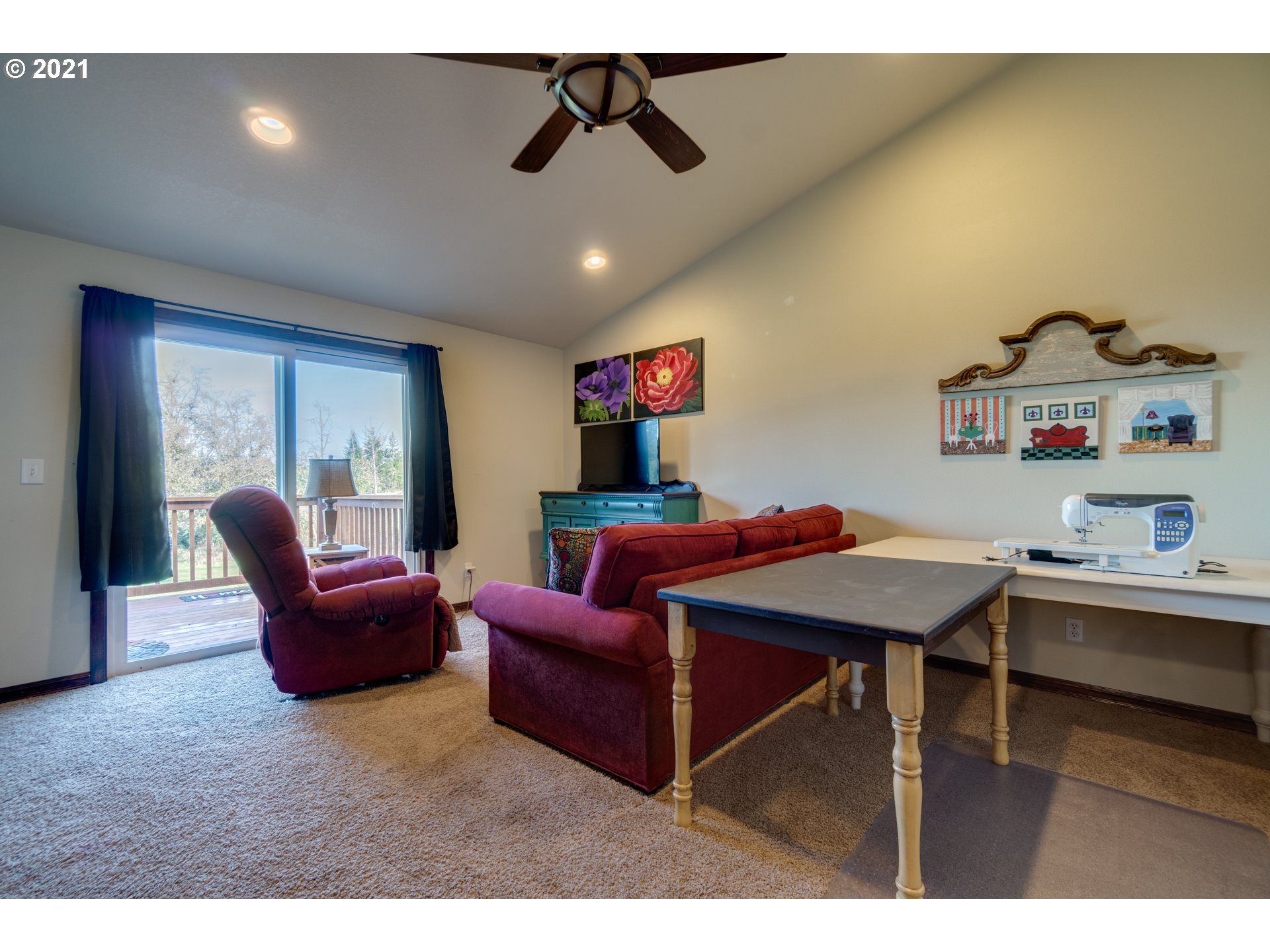 15587 South Pierce Road Molalla, OR 97038 - Photo 16 of 28 a living room with furniture a rug and a chandelier