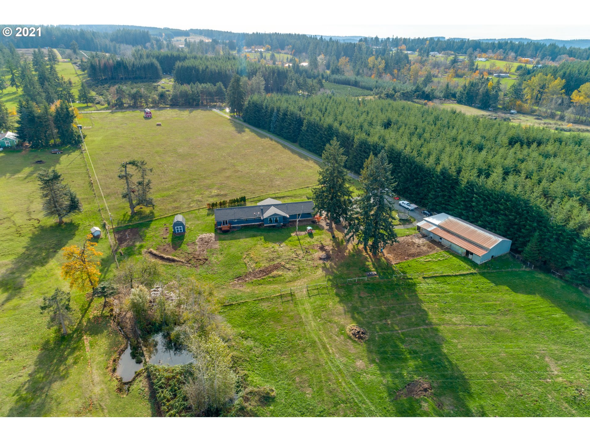 15587 South Pierce Road Molalla, OR 97038 - Photo 17 of 28 a view of a lake with a yard