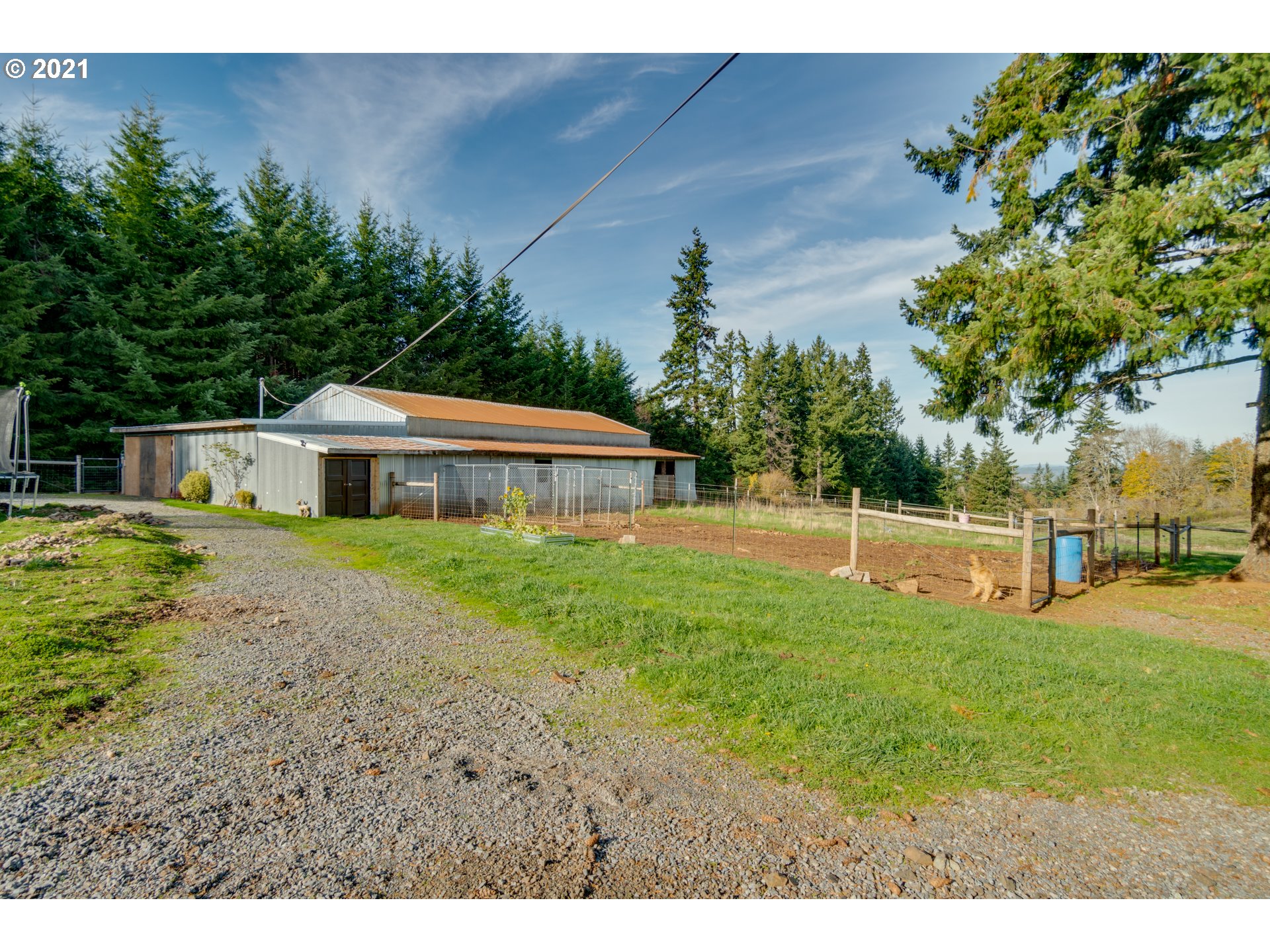 15587 South Pierce Road Molalla, OR 97038 - Photo 20 of 28 a front view of a house with a yard
