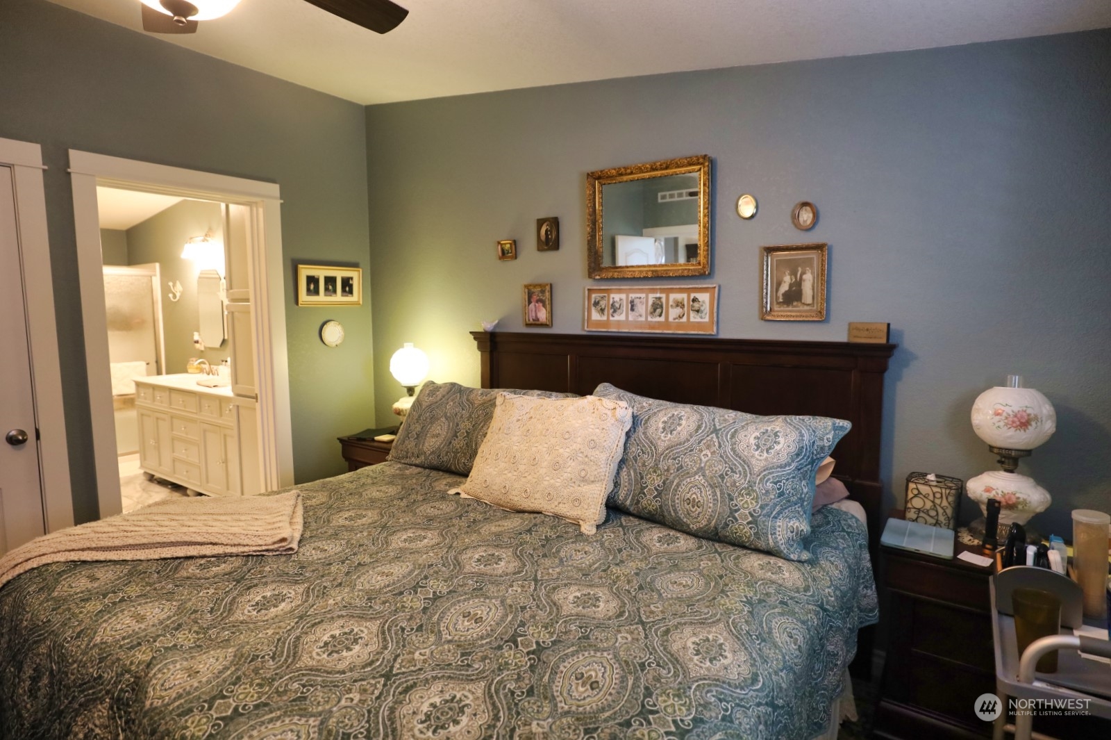 247 Ho Hum Lane Aberdeen, WA 98520 - Photo 5 of 24 a bedroom with a bed and wooden floor