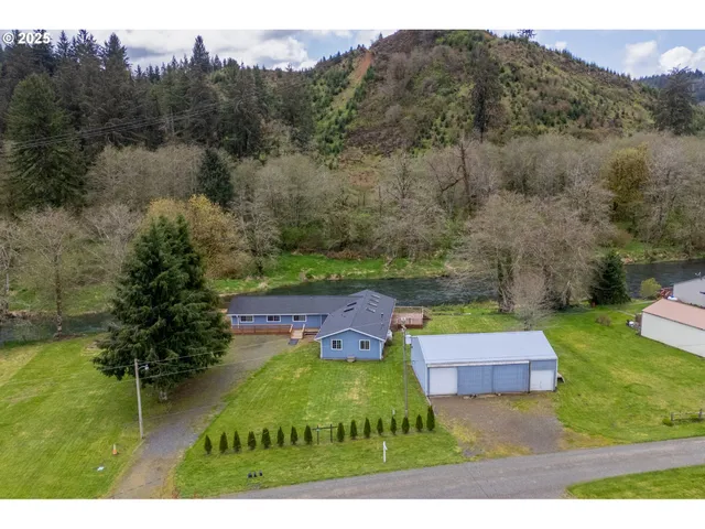 a view of a golf course with chairs