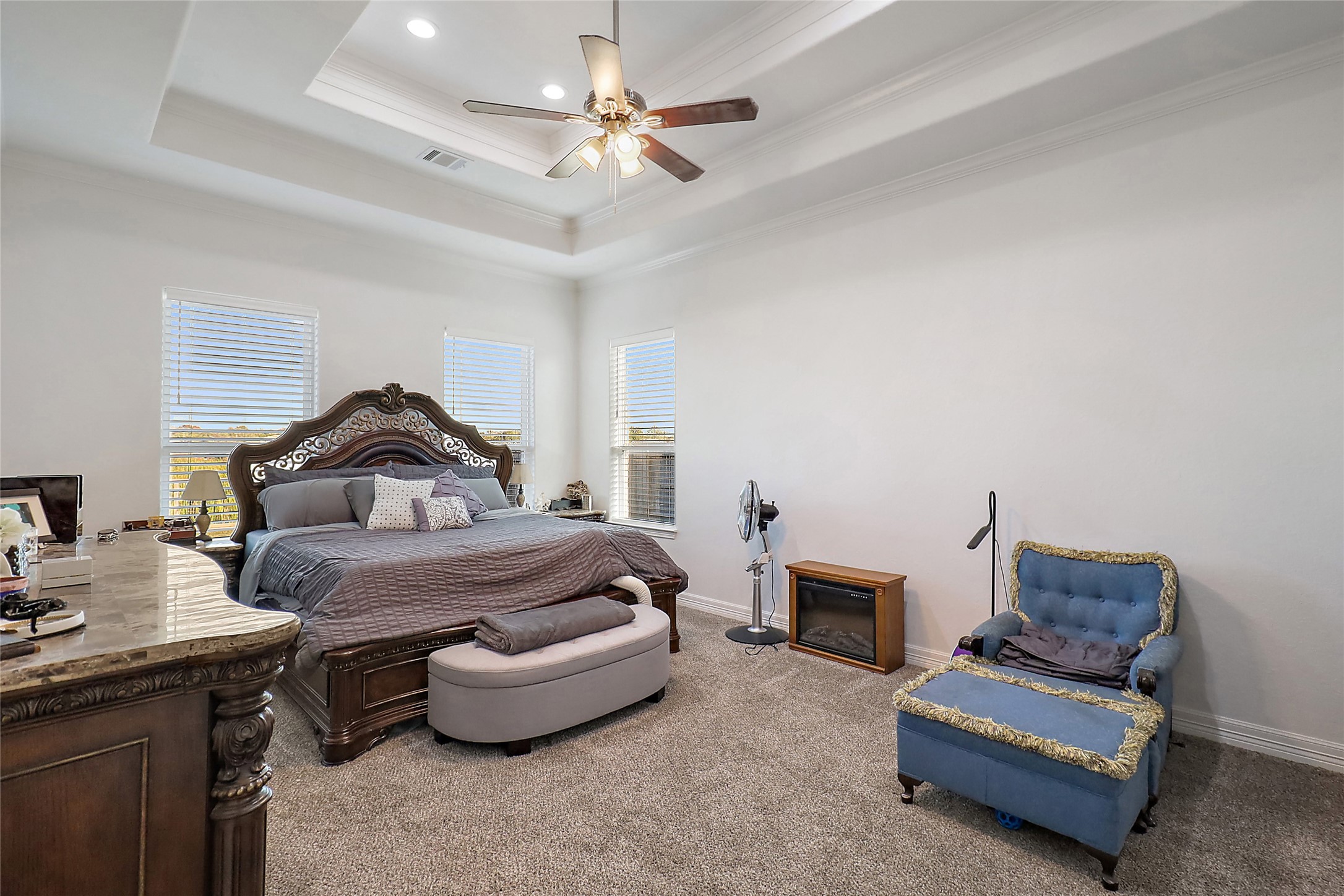 719 Cold Spring Drive Baytown, TX 77523 - Photo 19 of 33 a bedroom with a bed and a chandelier
