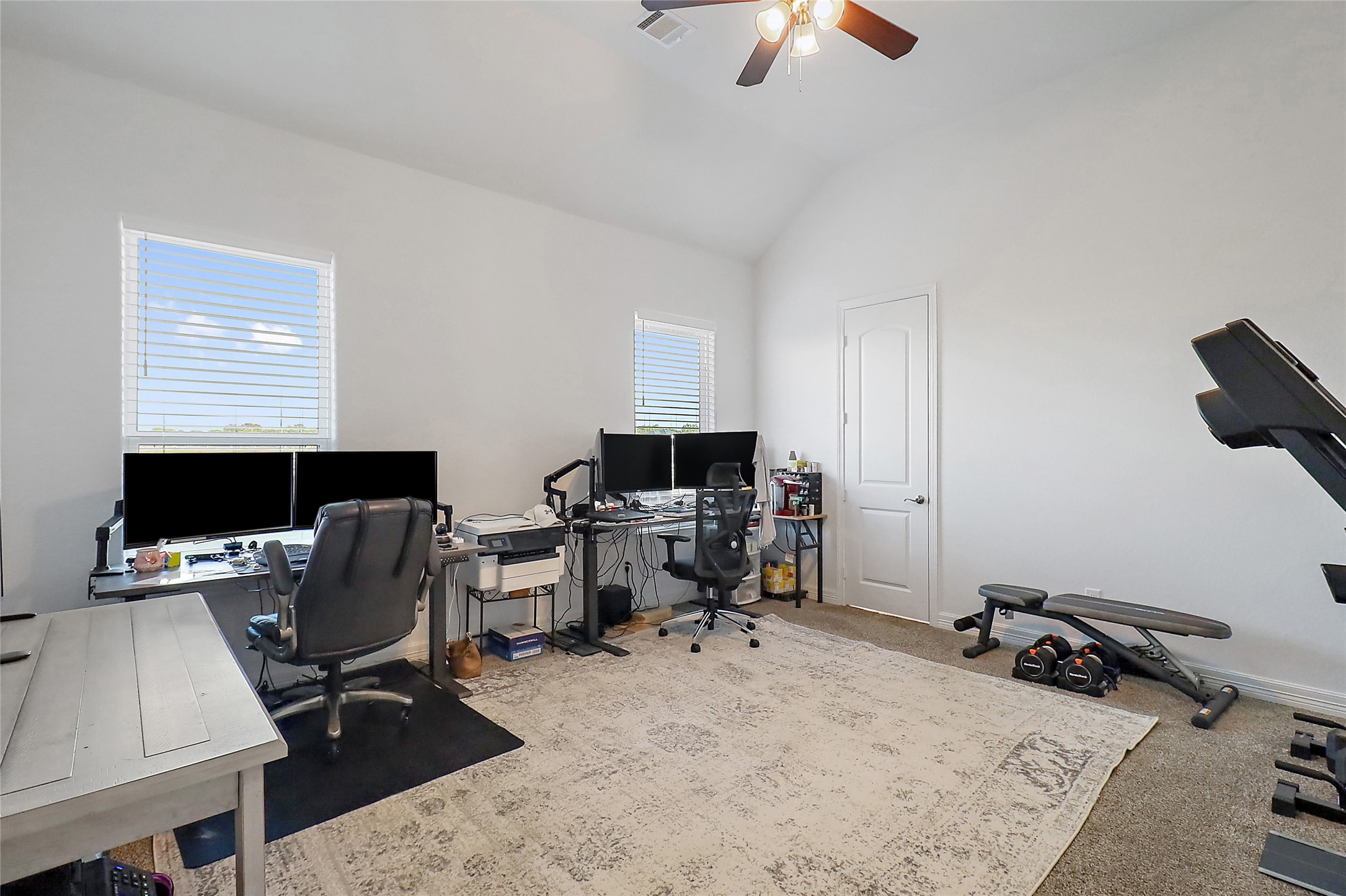 719 Cold Spring Drive Baytown, TX 77523 - Photo 24 of 33 a view of a workspace with furniture and a window