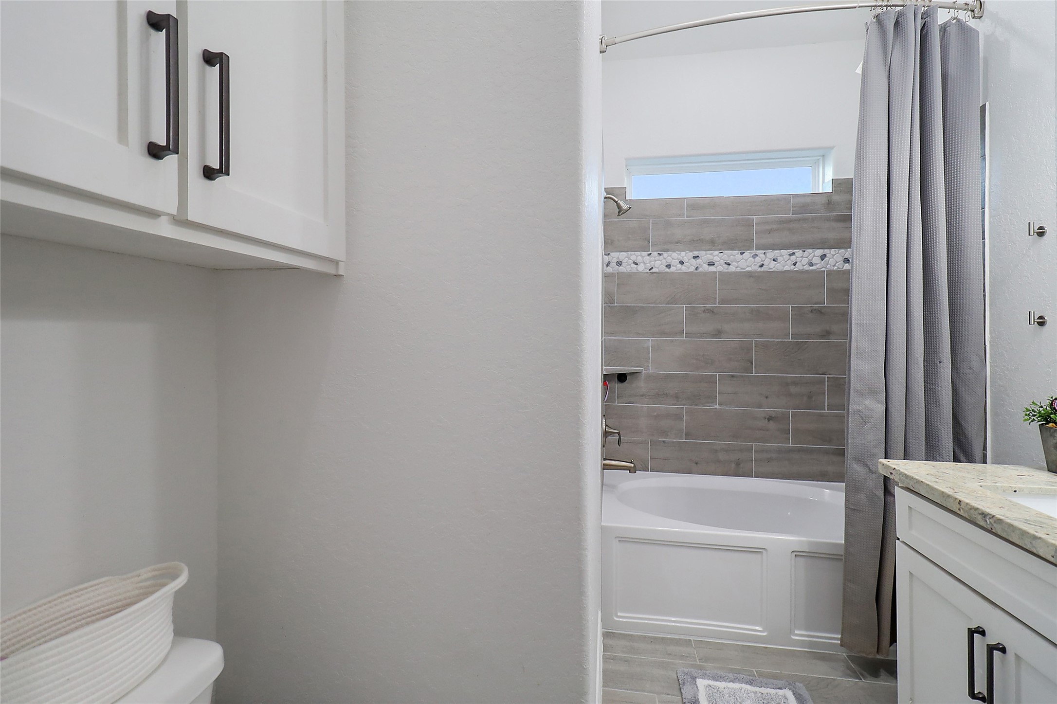 719 Cold Spring Drive Baytown, TX 77523 - Photo 26 of 33 a bathroom with a bathtub and a toilet