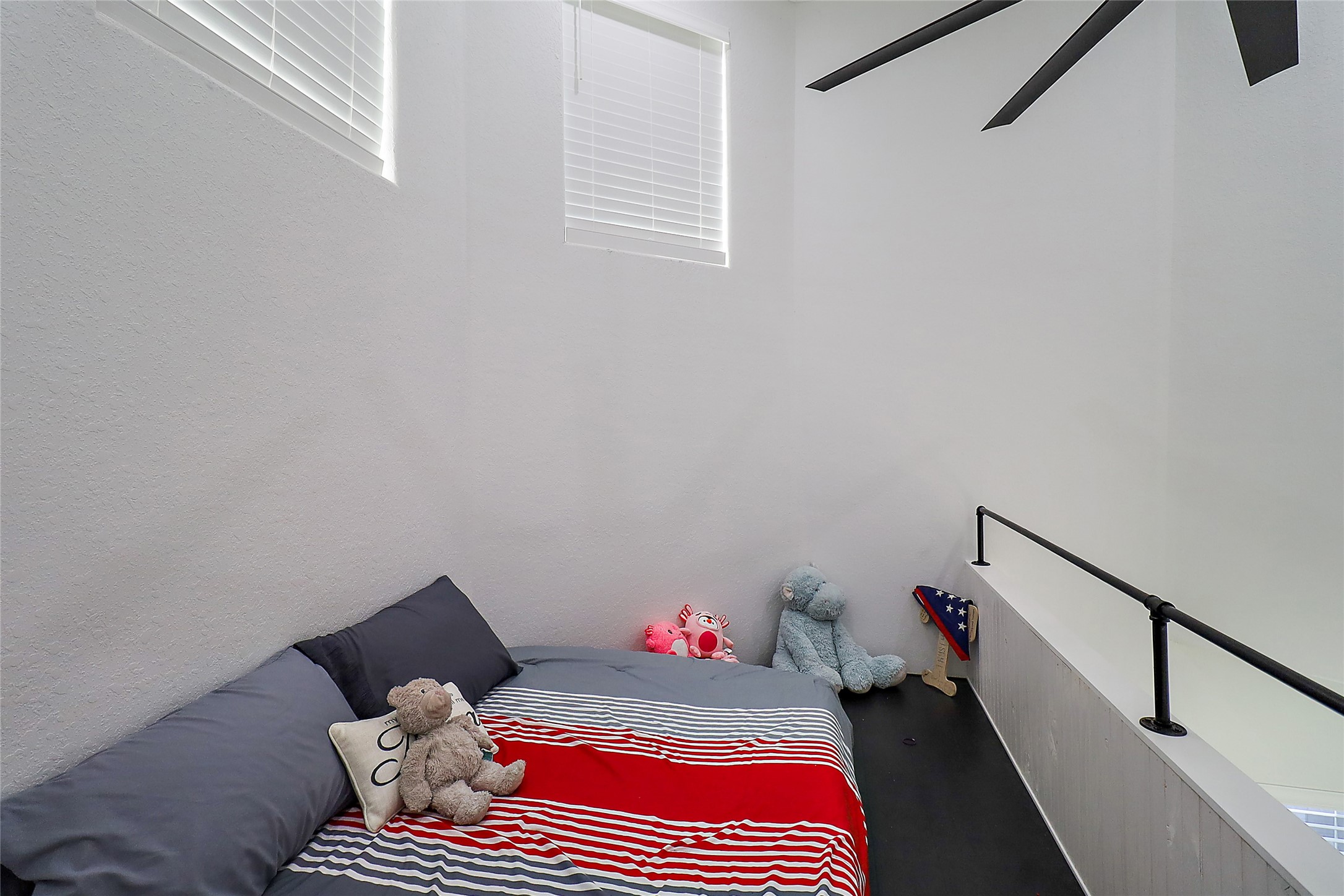 719 Cold Spring Drive Baytown, TX 77523 - Photo 28 of 33 a bedroom with a bed and window