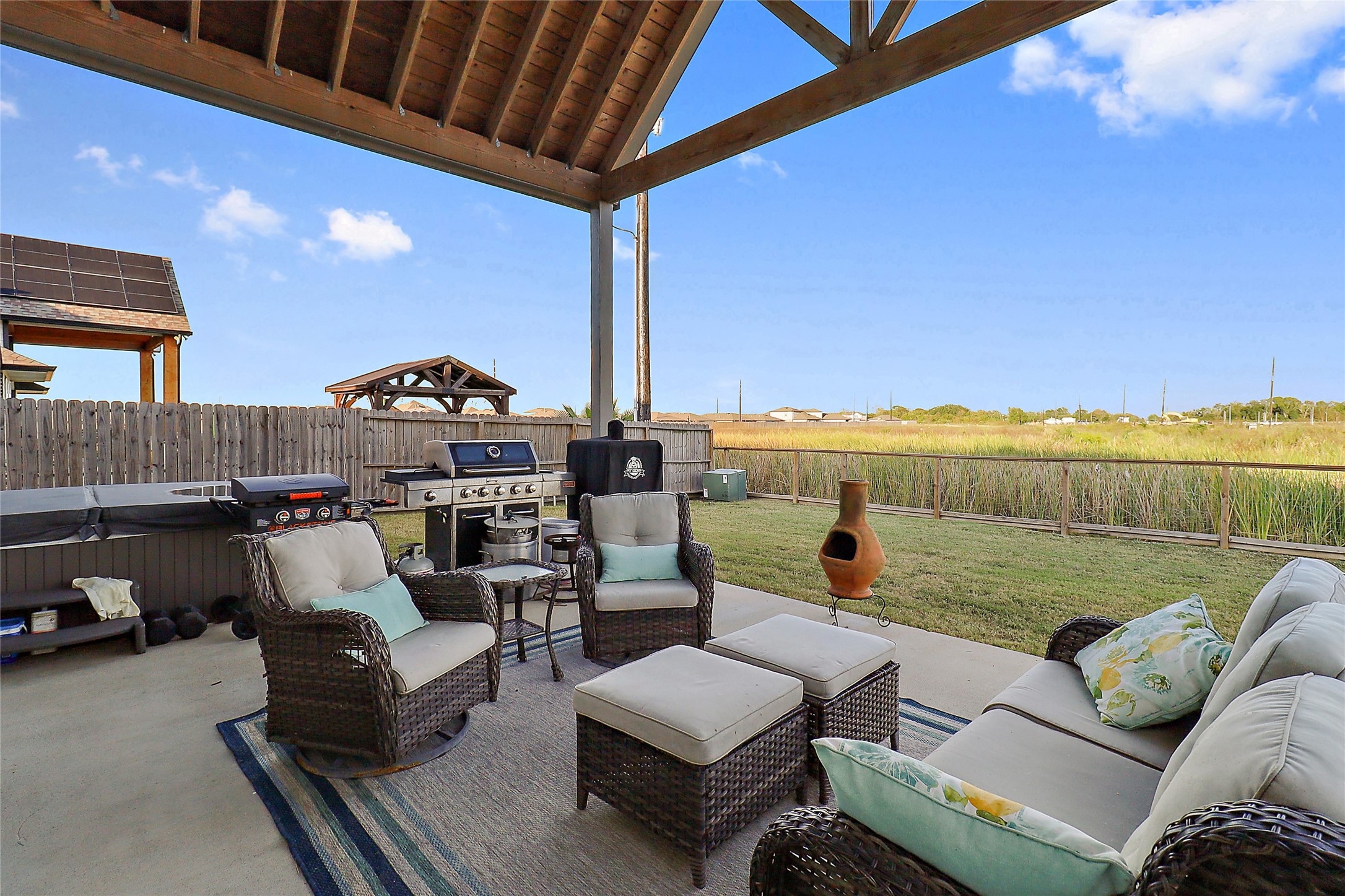 719 Cold Spring Drive Baytown, TX 77523 - Photo 30 of 33 a roof deck with couch and outdoor view