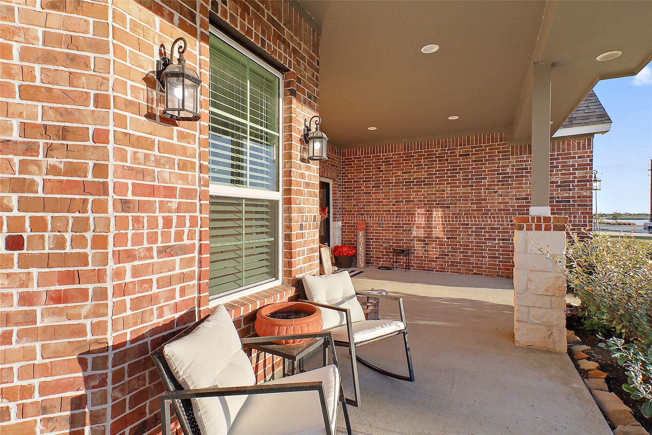 719 Cold Spring Drive Baytown, TX 77523 - Photo 4 of 33 a backyard of a house with table and chairs
