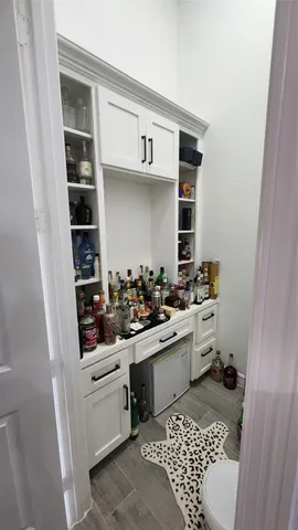 a kitchen with a sink and a stove top oven