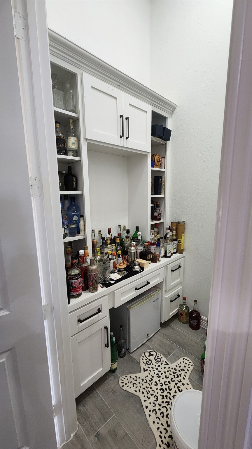 719 Cold Spring Drive Baytown, TX 77523 - Photo 7 of 33 a kitchen with a sink and a stove top oven