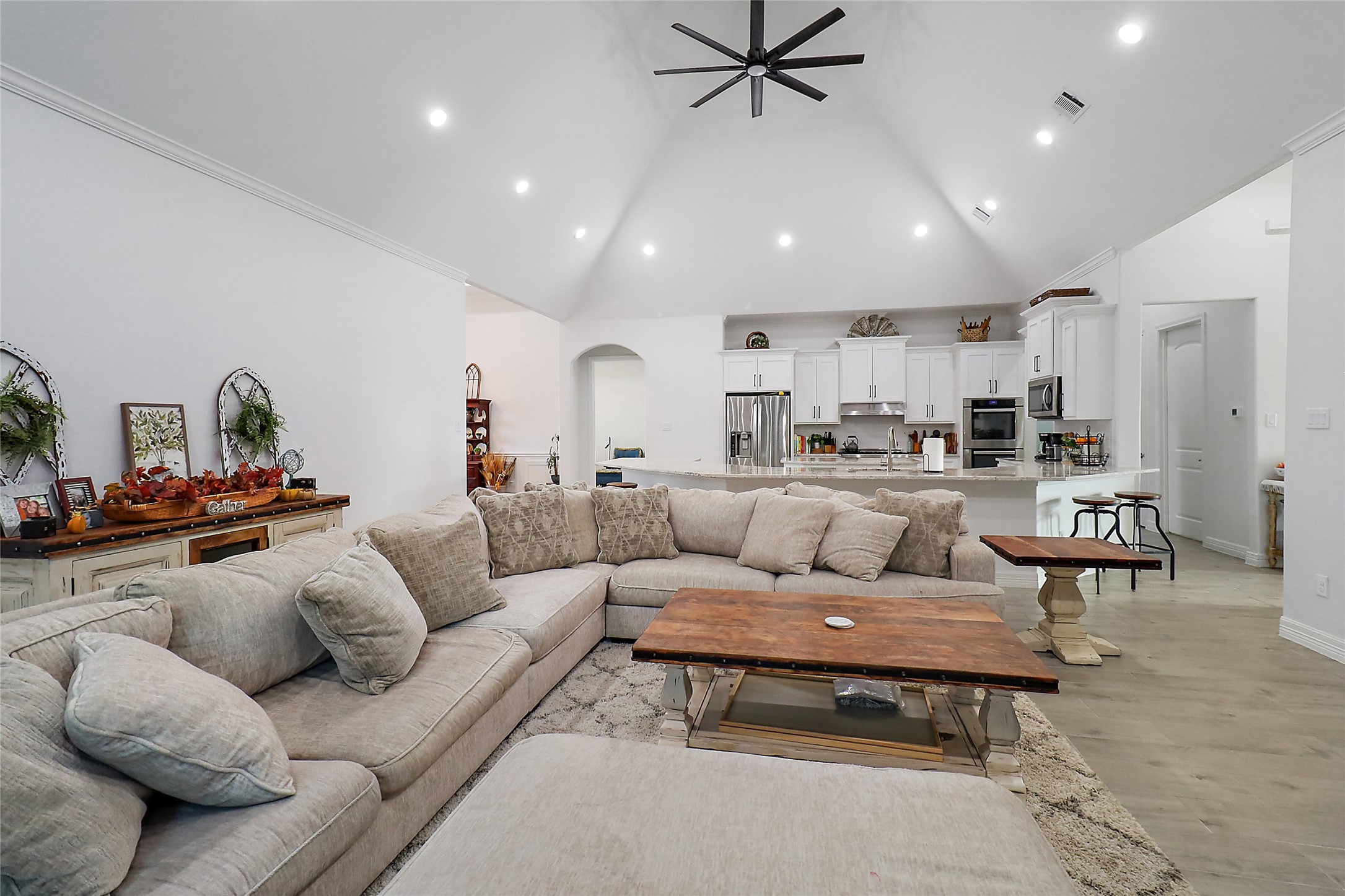 719 Cold Spring Drive Baytown, TX 77523 - Photo 8 of 33 a living room with furniture and a view of kitchen